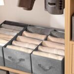 ⁦منظم ملابس وتربروف مقسم  4 خانات قابل للطي بيد لسهولة الحمل⁩ - الصورة ⁦3⁩