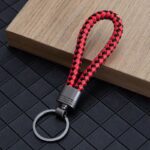 ⁦ميدالية مضفرة من الجلد لمفاتيح السيارة والمنزل وشنط السفر مع جزء لكتابة رقم الموبايل⁩ - الصورة ⁦9⁩