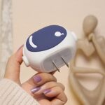 ⁦كفر حماية لشاحن وكابل الآيفون بتصميم رائد فضاء - قطعتين⁩ - الصورة ⁦5⁩