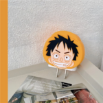 ⁦كفر حماية لشاحن وكابل وسلك الآيفون بتصميم لوفي _ قطعتين⁩ - الصورة ⁦3⁩