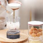 ⁦برطمان مخللات اكليريك 250 ملي علي شكل ساعة رملية بغطاء محكم الغلق مزود بشوكة⁩ - الصورة ⁦2⁩