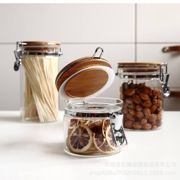 برطمان زجاج غطاء خشب بقفل 450 ملي لحفظ وتنظيم التوابل والمكسرات والبقوليات ‏