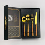 ⁦طقم معالق وشوك وسكاكين ستاليس ستيل جولد بيد خشب - 24 قطعة⁩ - الصورة ⁦3⁩