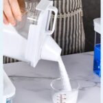 ⁦علبة تخزين مسحوق  الغسيل 1800 ملي مع كوب معياري محكم الغلق⁩ - الصورة ⁦2⁩