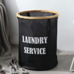 سلة غسيل قماش وتربروف بغطاء علوي ويدين من الجنب  لسهولة الحمل