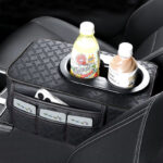 ⁦مسند سيارة جلد مبطن مع حامل أكواب مزدوج و منظم جانبي مقسم الي 4 خانات⁩ - الصورة ⁦5⁩