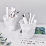 حامل أقلام بتصميم كوب لحمل وتنظيم الأدوات المدرسية