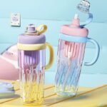 ⁦زجاجة مياه بلاستيكية بيد مريحة مناسبة للجيم بسعة 950 ملل⁩ - الصورة ⁦7⁩