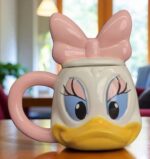 ⁦مج سيراميك بتصميم كرتوني بطوطة بيد كبيرة للمشروبات الساخنة⁩ - الصورة ⁦5⁩