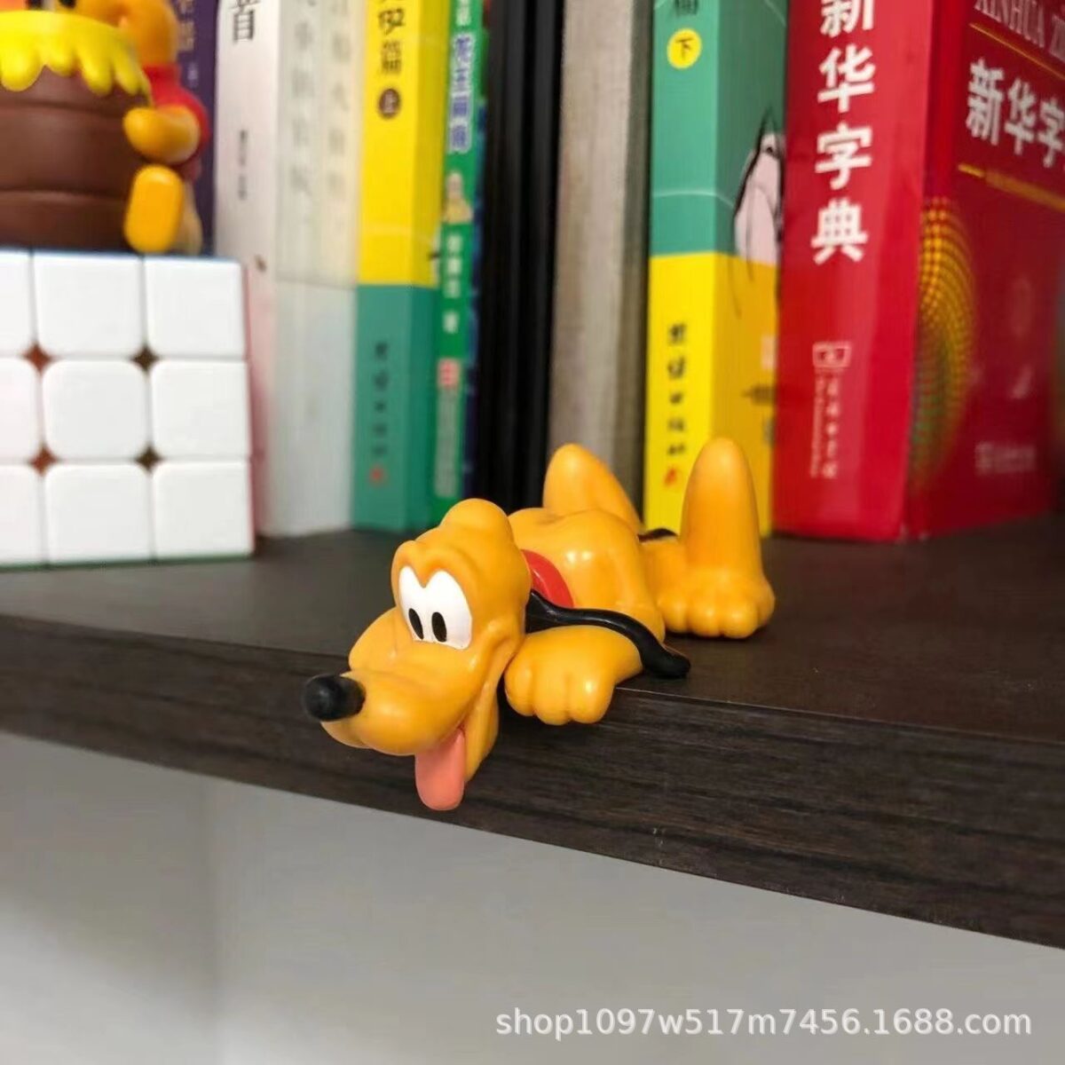 ⁦إكسسوار بتصميم بلوتو لتزين تابلوه السيارة⁩ - الصورة ⁦6⁩