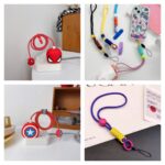 طقم ميدالية تعليق للموبايل + كفر لحماية الاشحن بأشكال كرتونية مجسمة