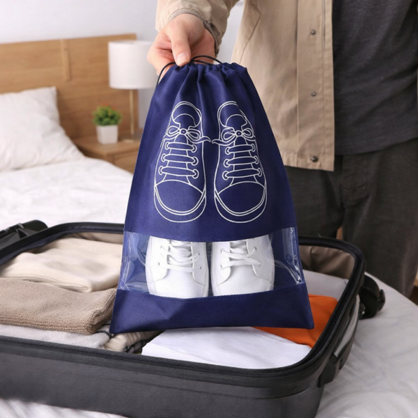 شنطة لحفظ الأحذية داخل شنط السفر بجزء شفاف ورباط للغلق