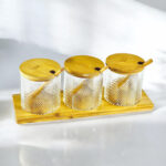 ⁦طقم برطمانات 3 قطع  زجاج مزجزج  مع حامل ومعالق خشب مناسب للسكر والشاي⁩ - الصورة ⁦3⁩