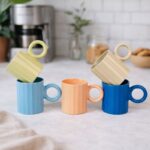 ⁦مج بورسلين بتصميم مضلع ويد دائرية لتناول النسكافيه 300 ملي⁩ - الصورة ⁦2⁩