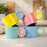 ⁦مج بورسلين بتصميم مموج ويد دائرية مناسب لشرب النسكافية والاتيه 350 ملي⁩ - الصورة ⁦4⁩