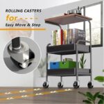 ⁦عربة لتنظيم الأدوات المكتبية بدورين وسطح خشبي وعجلات لسهولة الحركة⁩ - الصورة ⁦7⁩